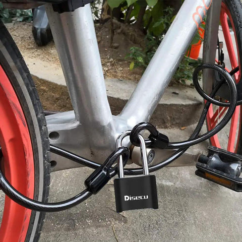 Heavy Duty 4 Digit Combo Padlock With 2.5 Inch Shackle Outdoor Waterproof Locker Lock securing a bike
