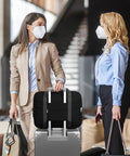 Women with Under Seat Personal Item Bag 18x14x8 Inch 30L Foldable Travel Duffel Tote on suitcase handle in airport.