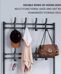 Three In One Tree Storage Bench With Industrial Shoe Rack And Eight Hooks Space Saving Organizer displayed with coats and bags