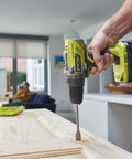 High Output 18V Cordless Drill Driver With 22 Torque Settings And Self Tightening Chuck, drilling into wood.