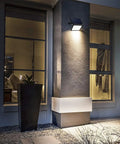 Ridiculously Bright Solar Dusk To Dawn Flood Light With 1000 Lumens, 299 LED, on an exterior wall illuminating a porch