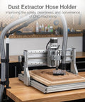 Tool Free Clamp On Dust Collection Boom Arm And Vacuum Hose Mount For Desktop CNC Machines, Table Saws with adjustable hose above wood.
