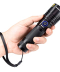 Hand holding 365nm UV Black Light Flashlight, 20W Rechargeable Wood Lamp For Pet Urine Detection, textured grip, wrist strap visible