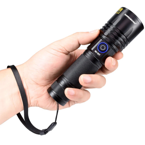 Hand holding 365nm UV Black Light Flashlight, 20W Rechargeable Wood Lamp For Pet Urine Detection, textured grip, wrist strap visible