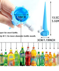 Close-up of 24 Pack Self Watering Spikes For Plants Automatic Indoor Plant Waterer With Adjustable Drip Valve next to bottles.