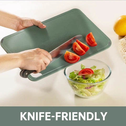 Set Of 3 Plastic Cutting Boards For Kitchen BPA Free Non Slip Dishwasher Safe Reversible With Grip Handles slicing tomatoes
