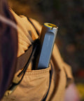 Tiny But Mighty LED Flashlight Rechargeable USB C in a pocket for camping and emergencies, showing rugged design.