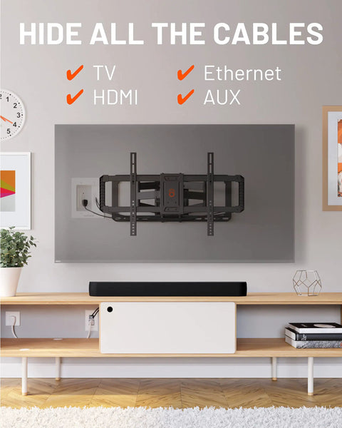Modern living room with wall-mounted TV showing In Wall TV Cable Management Kit With Dual Outlet For Wall Mounted TVs Hides Power And Low Voltage Cables Includes Saw Template Six Foot Extension Cord And All In One In Wall Module For A Clean No Wire Install.