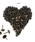 Premium 320 Piece Set Of Top Shelf Upholstery Tacks Featuring A Knockout Antique Brass Finish And Smooth Round Heads crafted from heavy duty iron in heart shape.