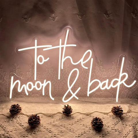 To The Moon And Back LED Neon Light Sign with Adjustable Brightness showing warm white glow in cozy decor setting