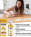 Woman using Natural Beeswax Furniture Polish Spray For Wood Tables And Cabinets Restores That Top Shelf Shine on a wooden table.