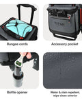 Close-up of Titan Collapsible Wheeled Soft Sided Cooler With Detachable Rolling Cart, showing bungee cords, accessory pocket, bottle opener, and water-resistant exterior