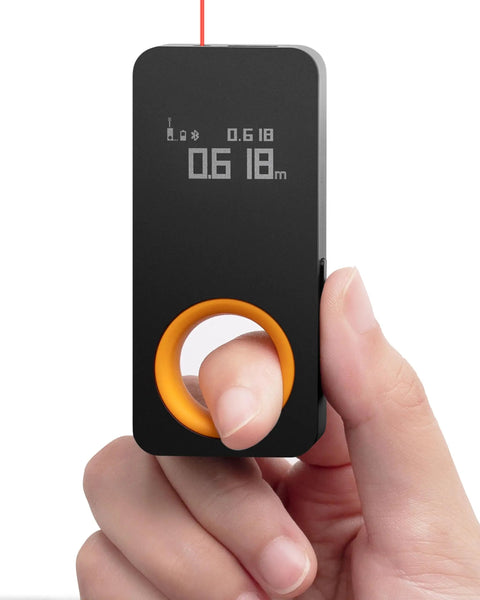 Pocket Size Laser Measuring Tool With 98 Feet Range And 2mm Precision, USB C Rechargeable, OLED Display held in hand