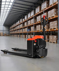 VEVOR Electric Pallet Jack Truck in a warehouse, 27x48 in steel forks, designed for lifting 4400 lbs of heavy loads.