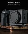 Silicone L Shape Hand Grip for Sony Alpha 6700 Camera With Built-In Arca-Swiss Quick Release Plate on wooden table