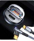 Close-up of No Hassle 125W Car Fast Charger With PD 65W USBC and QC 60W USBA dual ports, showcasing metal frame and cable.
