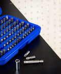Open blue case of Security Bit Set 100 Piece Cr V Steel With One Quarter Inch Adapters includes various tamperproof bits