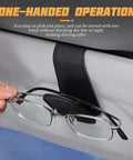 Premium Microfiber Leather Magnetic Sunglasses Holder For Car Sun Visor With Strong Grip and Sleek Black Finish secured with glasses.