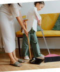 Legit Heavy Duty Pink Broom With Sturdy Steel Handle And Ultra Soft Bristles For Zero Sweat Indoor And Outdoor Floor Cleanup Compact Reusable Dust Brush That Really Cleans, used for tidying floor mess with a child.