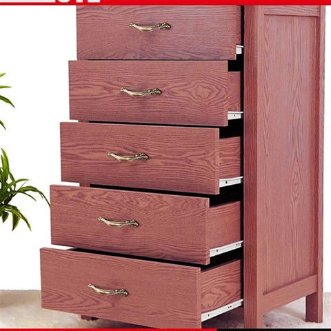 Wooden dresser with drawers showing heavy duty drawer slides and cabinet rails set for smooth sliding 16 inch roller pulley system