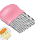 Pink plastic-handled crinkle cutter with stainless steel comb blade for slicing potatoes