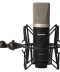 Condenser XLR Microphone With Large Diaphragm Cardioid Studio Mic Kit Including Shock Mount For Studio Recording Live Streaming Podcasting Voiceover And YouTube Black, front view.