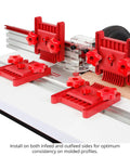 Rock Solid Variable Pressure Featherboard 2 Pack showing red adjustable mounting clamps on router table for stability.
