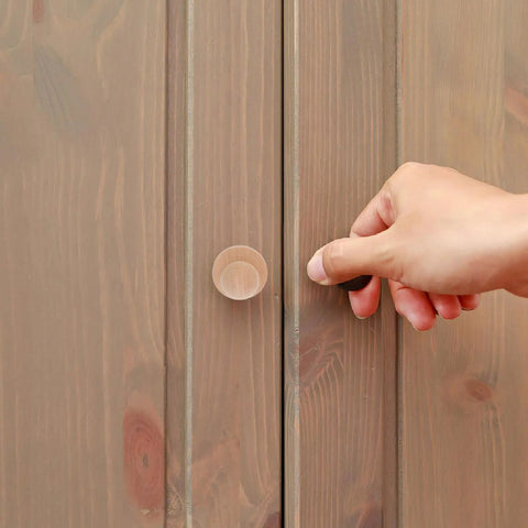 Person using Top Shelf Unfinished Wood Drawer Pulls Ten Pack Round Mushroom Cabinet Knobs on wooden cupboard.