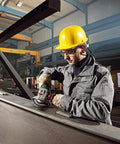 Worker using 6 Inch Angle Grinder With 13.5 Amp Power, 9,600 RPM, Lock On Switch for metal grinding in factory.
