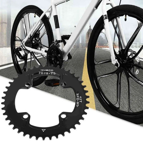 Dope Lightweight Aluminum Chain Ring 104 BCD 40T 42T Narrow Wide Round Chain Ring For Mountain Bike And Single Speed CNC Machined Replacement Part For AM And XC Cranksets displayed with bike