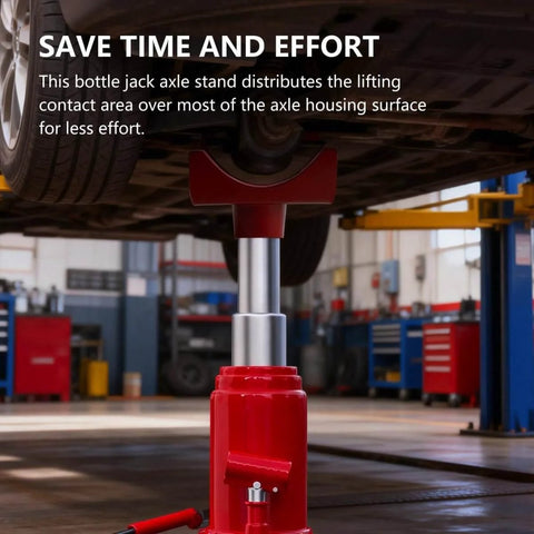 Heavy Duty Bottle Jack Axle Adapter Saddle installed on a vehicle lift with round axle tube support in a garage setting.