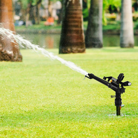 Irrigation Sprinkler 1.5In To 1In DN25 Female Thread Adjustable 360 Degree Rotating Rocking Arm watering a lawn
