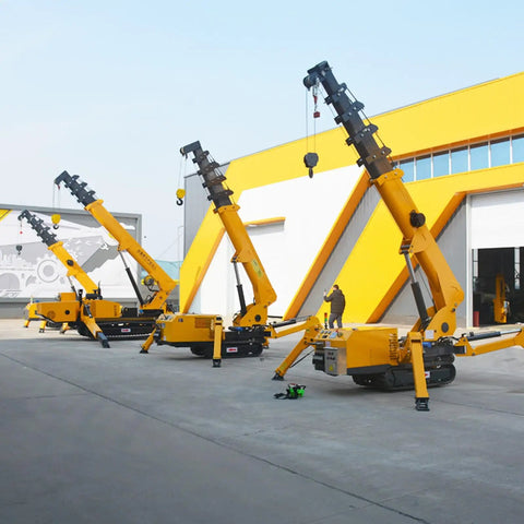 Three Portable Mini Crawler Cranes With Wireless Handheld Transmitter And Dependable Hydraulic Pump outdoor in a work area.