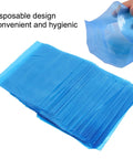 200 Pack Thickened PE Machine Covers Large 125x135cm Moistureproof Protective Bags stacked, hand holding one cover
