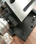 Close-up of Precision Tilting Rotary Table With Six Jaw Self Centering Chuck for Dead Nuts Angular Control and Clean Sweeps.