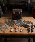 Durable 297-Piece Mechanic Tool Set with Quarter Inch, Three Eighths Inch, and Half Inch Drive Sockets displayed on table