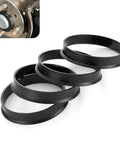 Heavy Duty 4 Pcs Car Wheel Hub Center Rings Reducer Adapters 73.1 Mm To 64.1 Mm Plastic Centric Rings in black, close-up view showing four rings.