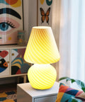 Tall Mushroom Glass Table Lamp With Romantic 12 Inch Vintage Swirl Mid Century Design on bedside table in vibrant room.
