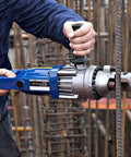 Close-up of Beast Mode Hydraulic Rebar Cutter Portable Edge Saw cutting steel bar on construction site