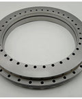 Ultra High Precision YRT325 Turntable Rotary Table With Slewing Bearing and Nylon Retainer, steel ring showcasing precision holes.