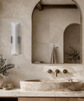 Tonabona 20" LED 18W 3000K Natural Alabaster Marble Farmhouse Bathroom 2 Pack Black Wall Sconce in modern bathroom setting.