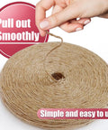 Hand holding 600 Feet Natural Jute Twine String For Crafts Gift Wrapping Packing Gardening Crochet Knitting Macrame Decor All Purpose 3 Ply 2mm Brown Eco Friendly Utility Line.