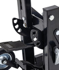 Zero-turn lawn mower lift jack, black steel with foot pedal, bolted brackets and pivot arms.