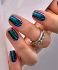 CurvLife Short Square Chrome Press On Nails With Electric Mirage Colorful Finish showing glossy rainbow reflection and layered design.