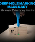 Long Reach Heavy Duty Chalk Powder Shot Marker With Vivid Green Dust marking 2 inches deep on wood using precise chalk application.
