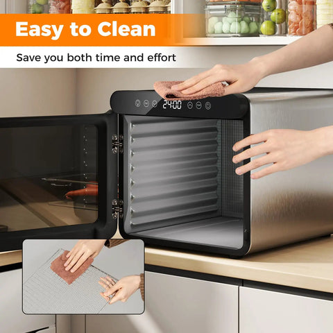 Top Tier Food Dehydrator With Seven Sturdy Stainless Steel Trays And No Sweat One To Twenty Four Hour Timer For Smooth Quiet Jerky Fruit Veggie Herb Treat Drying being cleaned with a cloth.