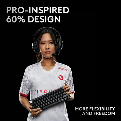 Compact Sixty Percent Wireless Gaming Keyboard Featuring Tactile Optical Switches And Sleek Magenta Build crafted for serious esports grinders, held by a gamer.
