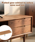 Forty Piece Pack Of Tack In Drawer Glides And Nail On Runner Tracks Featuring Tough Plastic Cushions on wooden cabinet drawers.