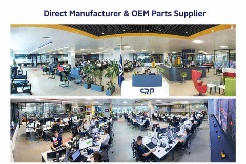 Modern office interior of an OEM parts supplier showcasing workstations and employees in a collaborative environment.