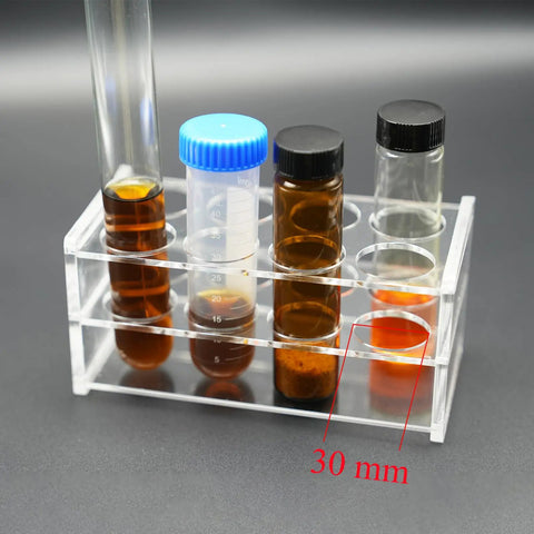 Clear Acrylic Test Tube Rack With Eight Wells For 50 Milliliter Centrifuge Tubes, 30 Millimeter Hole Diameter, Transparent Three Layer Design For Secure Neat Lab Organization And Easy Storage, filled with test tubes on a black surface